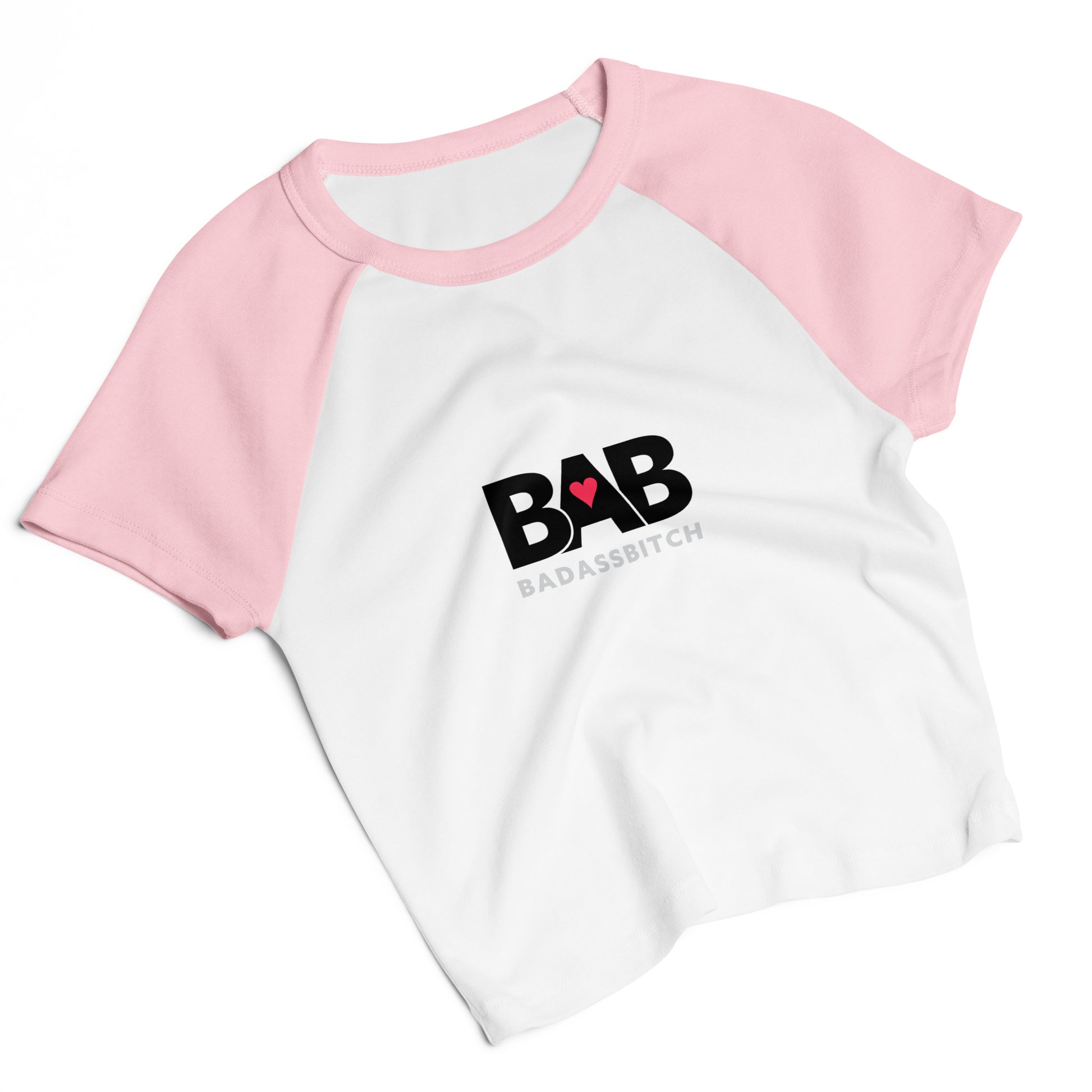BAB Badass raglan baby tee in pink and white with red heart graphic – front flat view