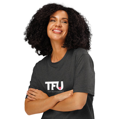 TFU Total Unit organic cotton Dark Heather Grey tee with red heart graphic – front view on woman with crossed arms