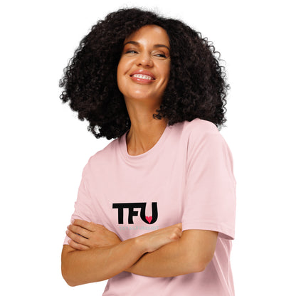 TFU Total Unit organic cotton Pink tee with red heart graphic – front view on woman with crossed arms